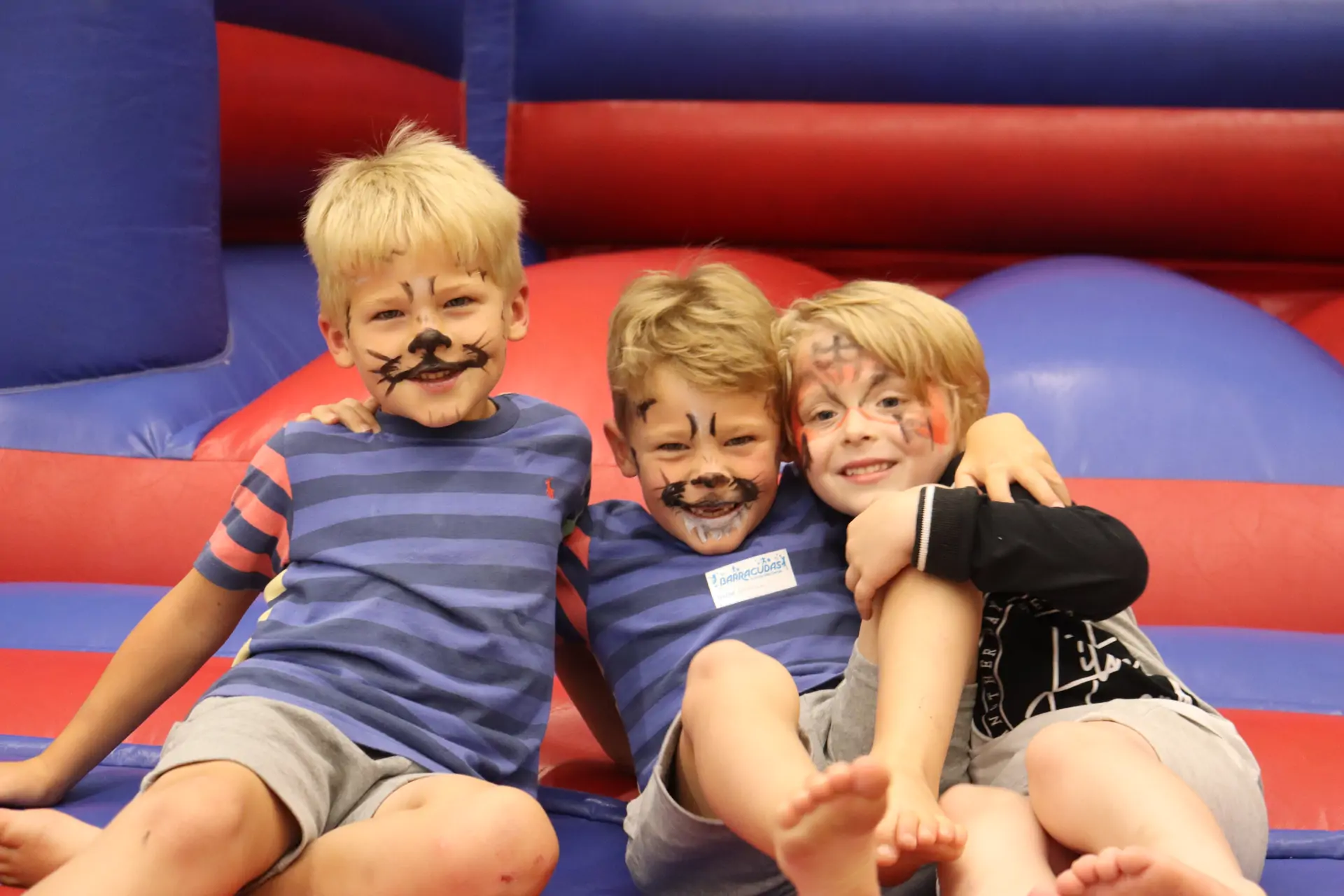 Bouncy castle boys with facepaint 4-5.jpg