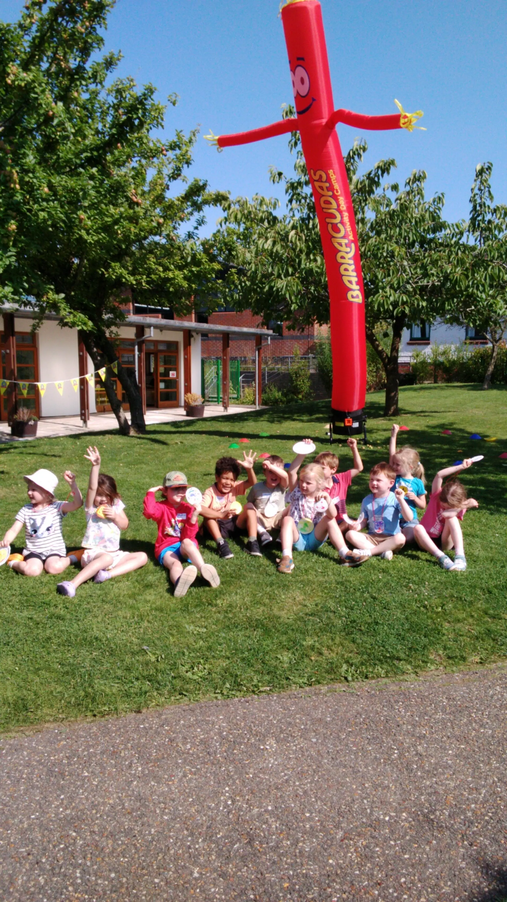 Letchworth children sitting on grass