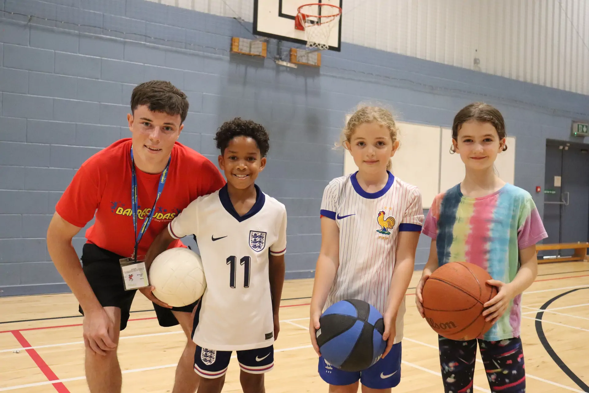 Smiling group with ball with staff 8-10.jpg
