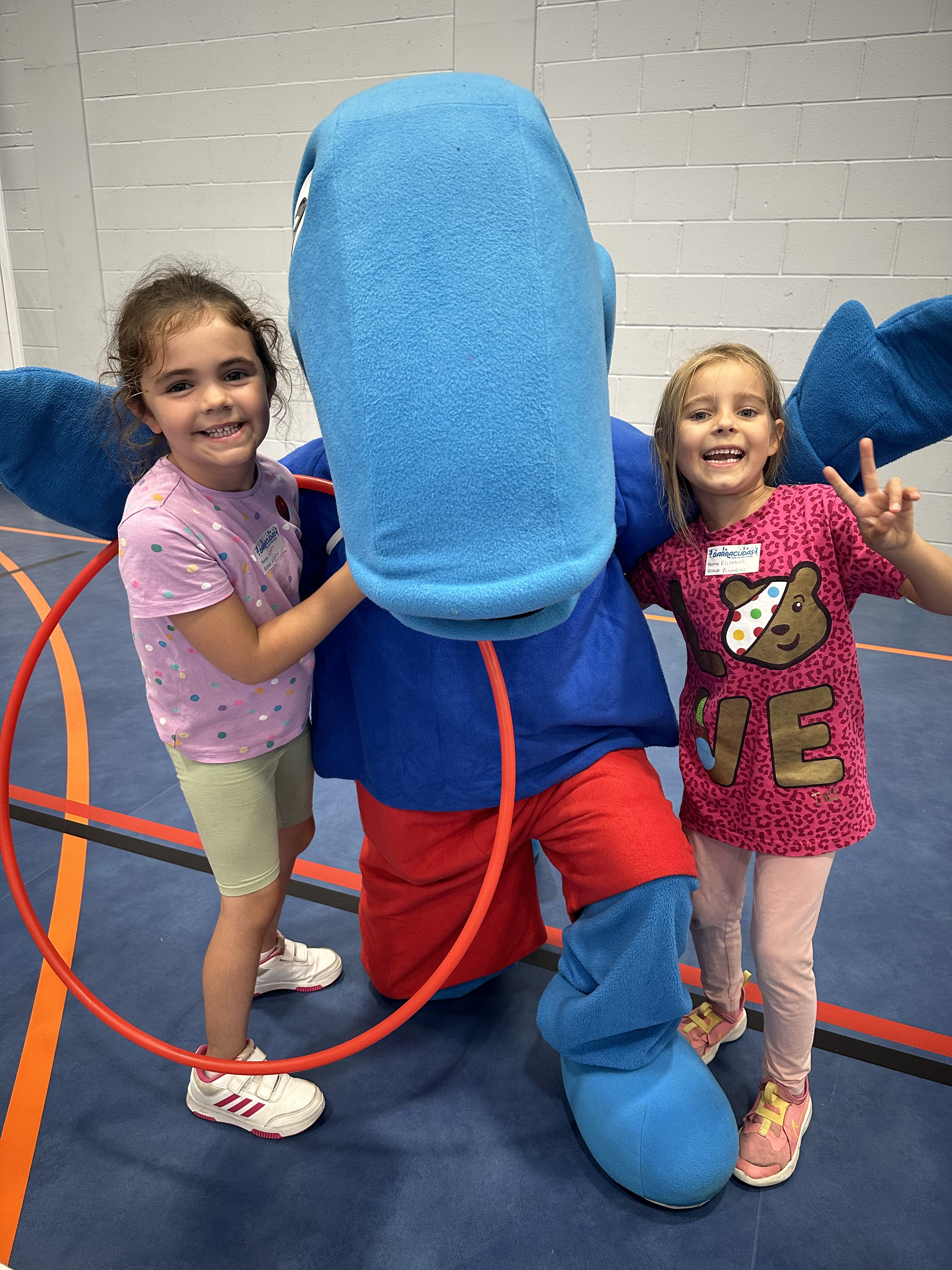 Billy Barracuda with children at Chigwell camp.png