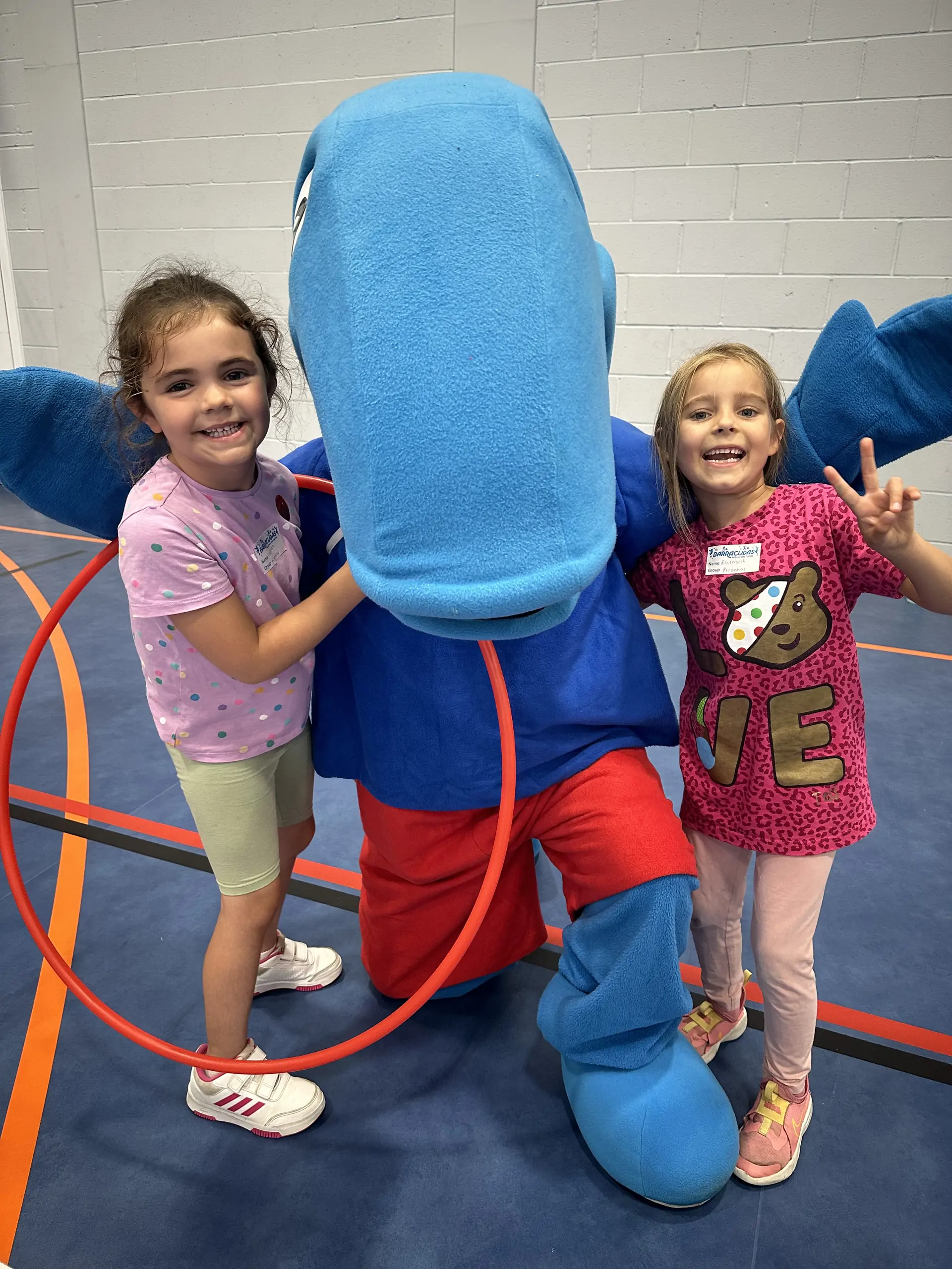 Billy Barracuda with children at Chigwell camp.png