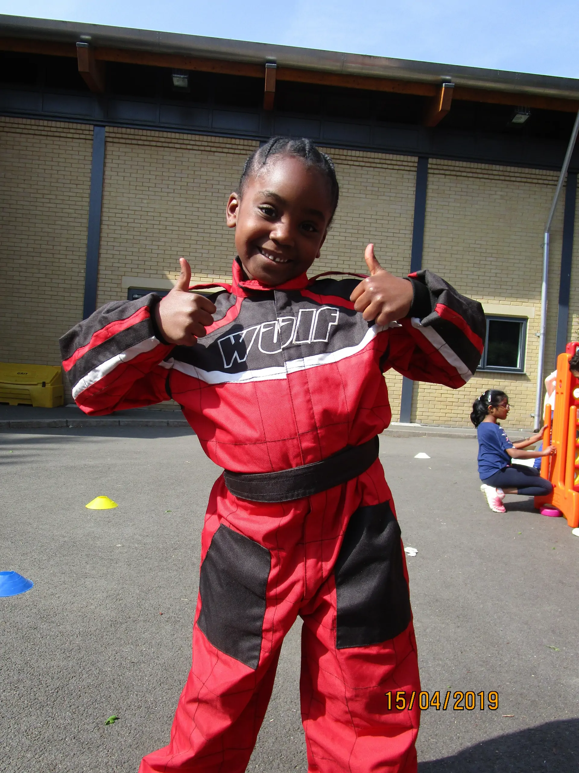 Barnet motorsports girl smiling thumbs up.jpg