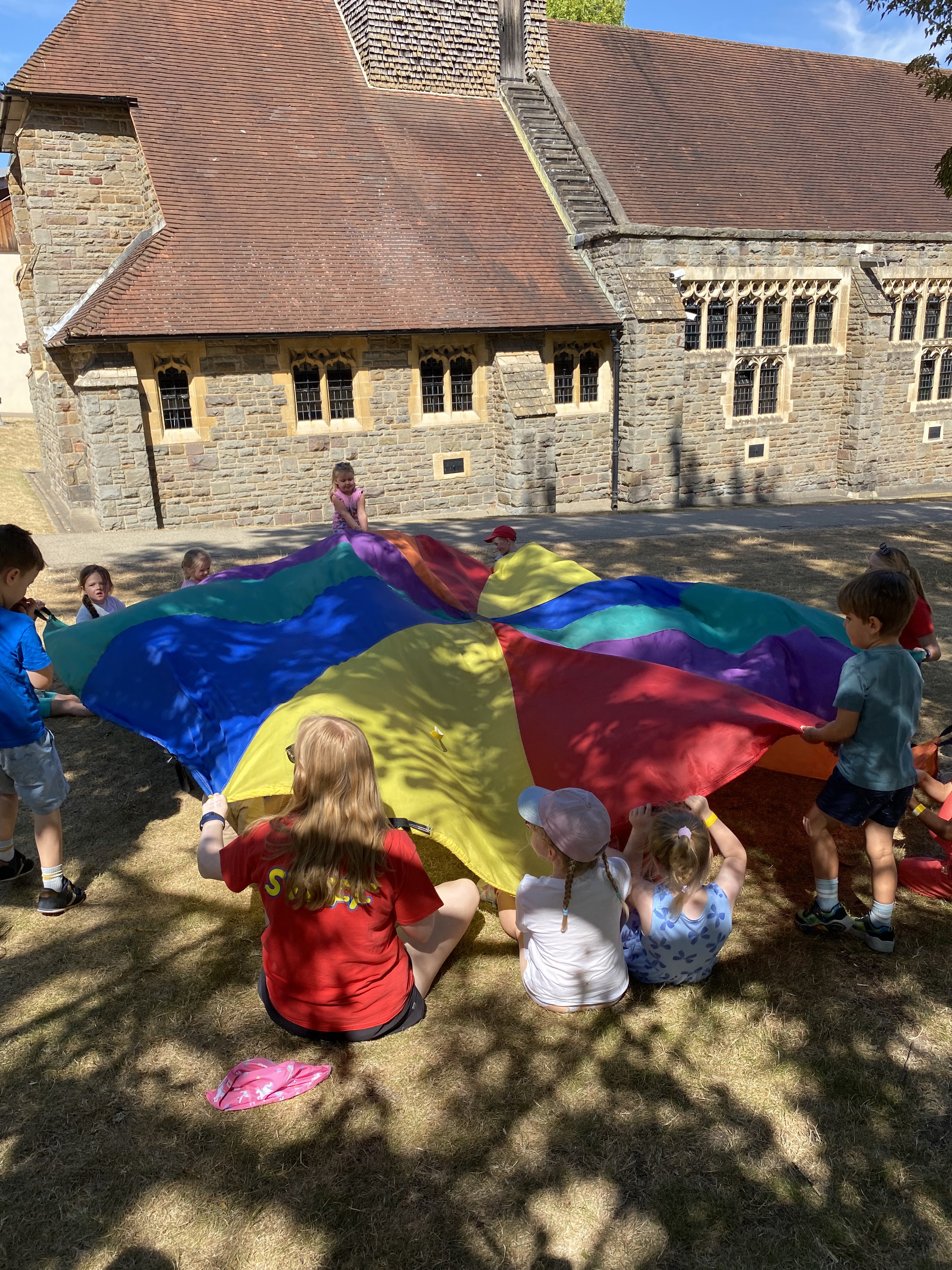 Parrachute games at Barracudas High Wycombe camp.jpg