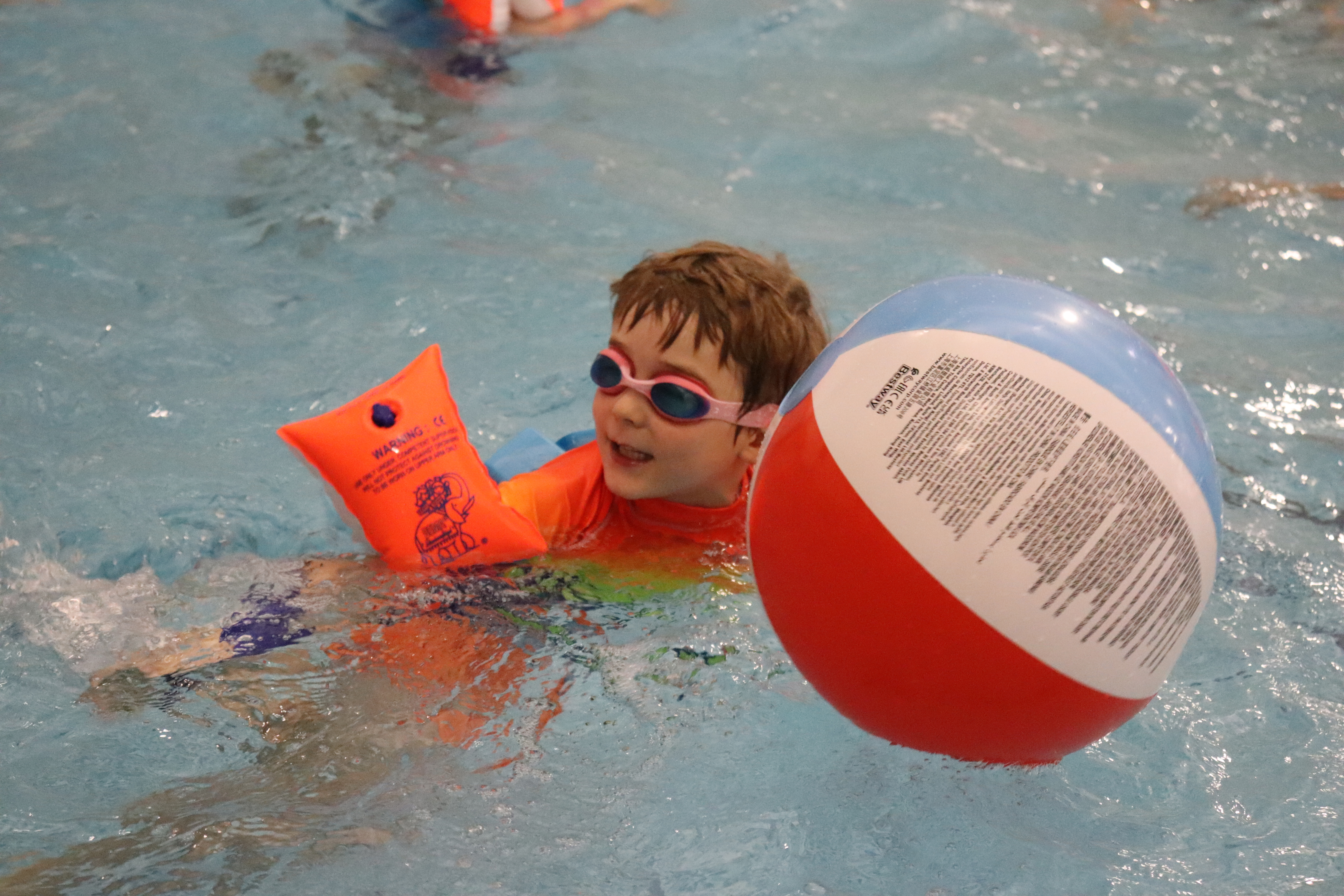 Barracudas camp swim session with inflatable and armbands.jpg