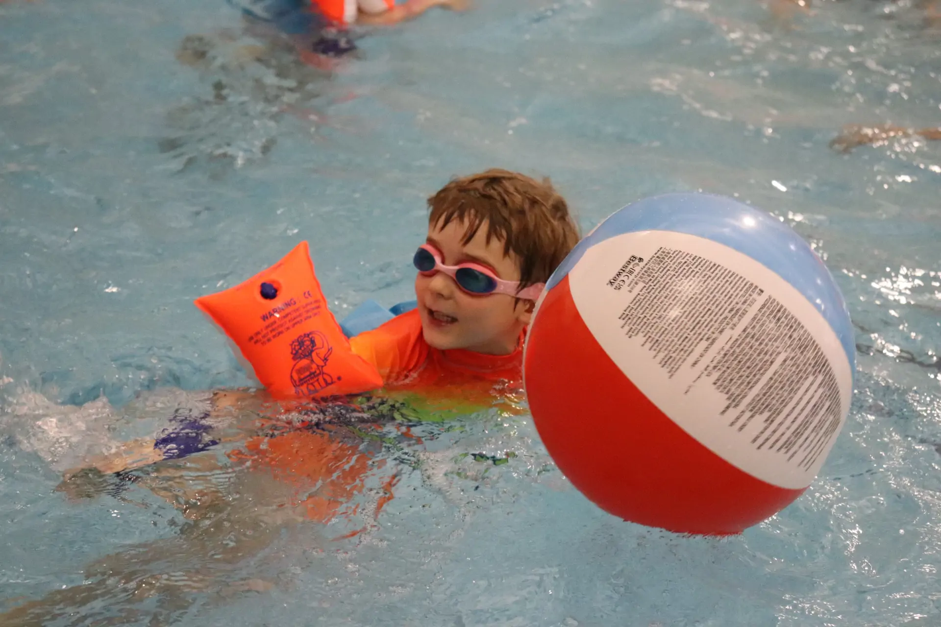 Barracudas camp swim session with inflatable and armbands.jpg