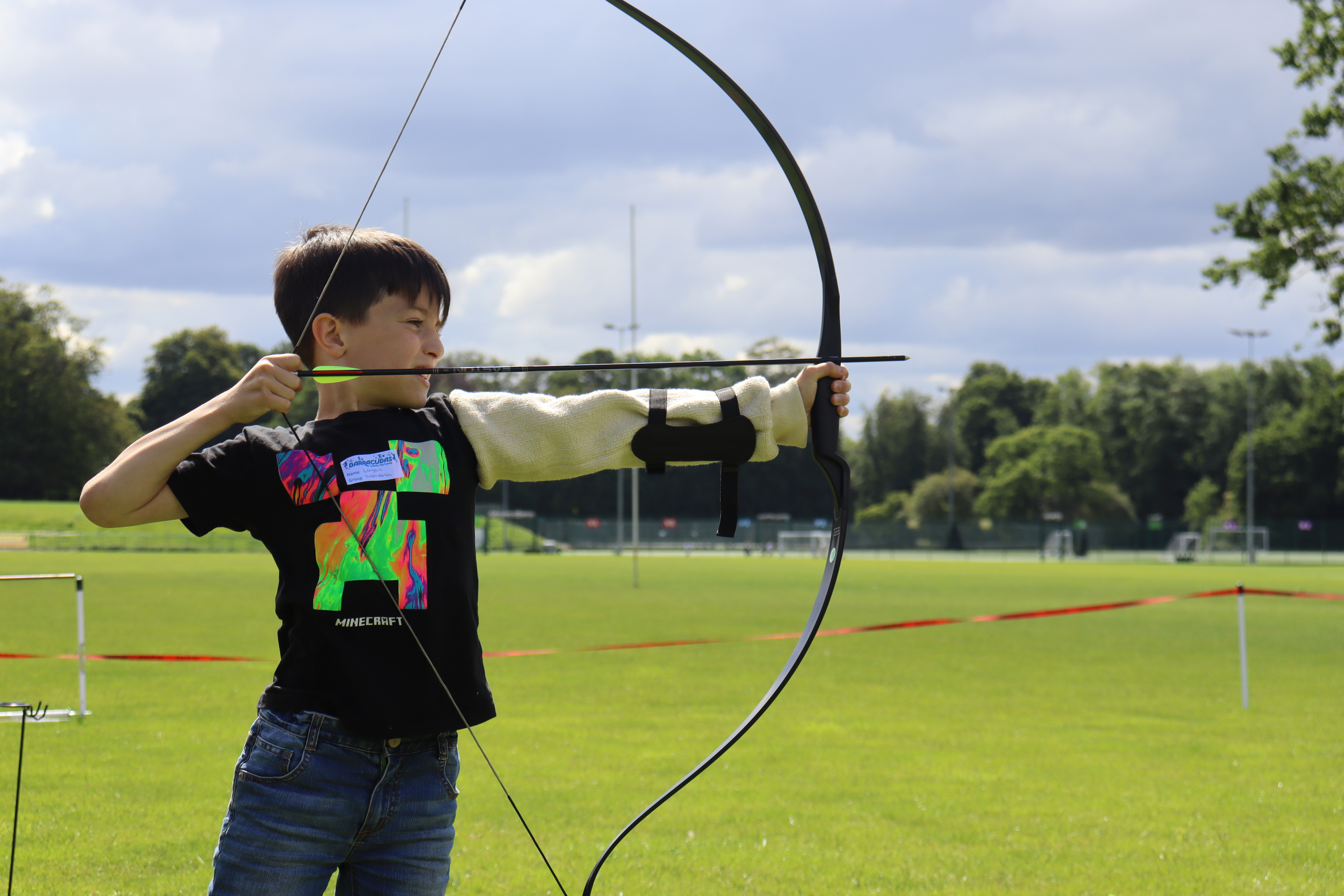 Barracudas camp archery boy.jpg