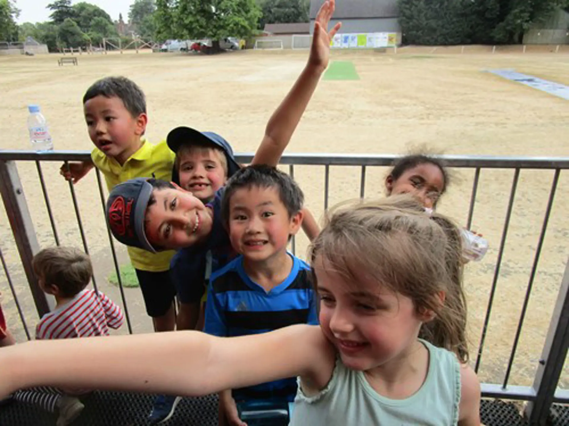 Children smiling at Barracudas Cambridge St Faiths camp.jpg