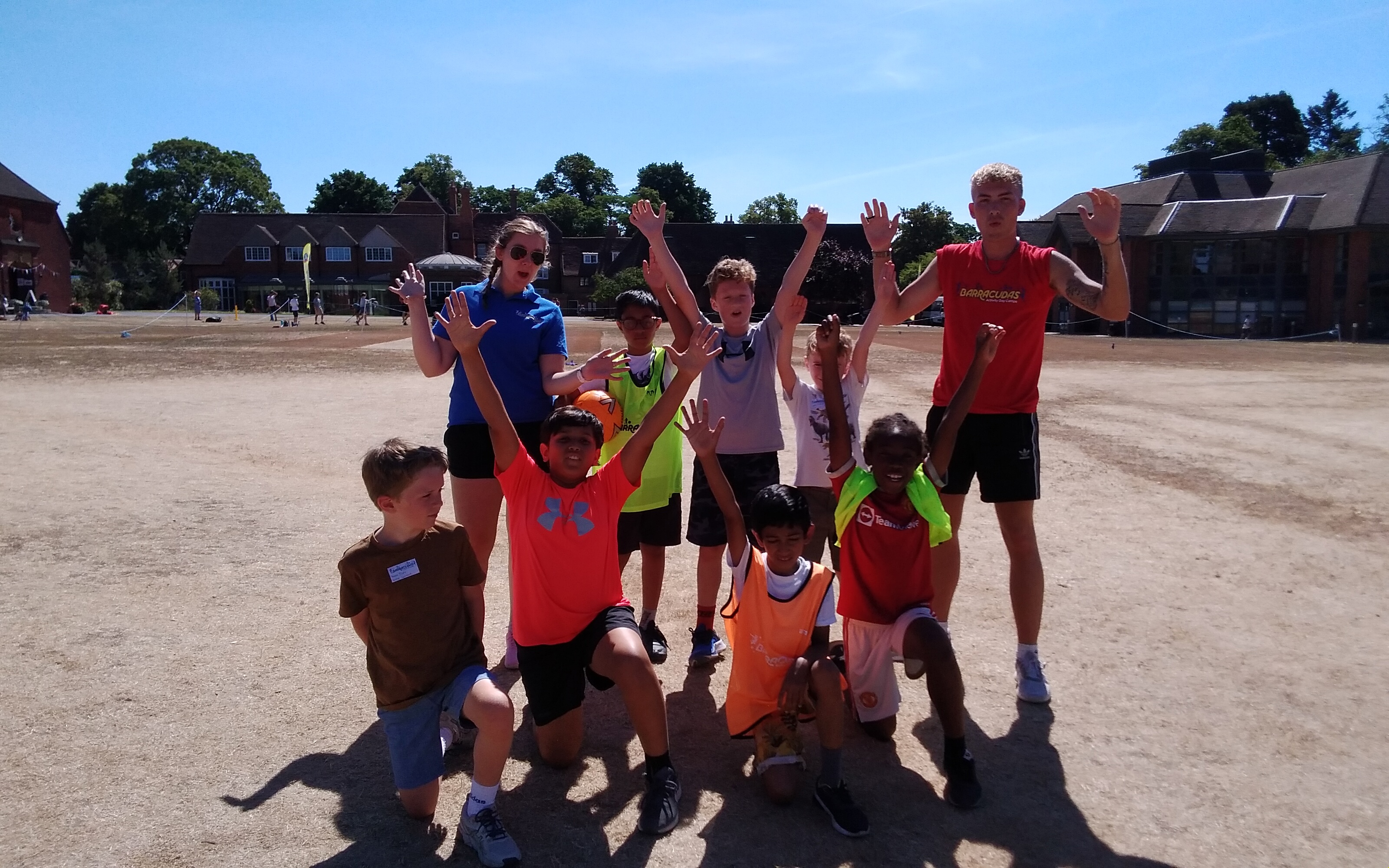 Barracudas Chigwell camp hands up on field
